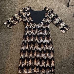 Sequin party dress with 3/4 sleeves and low back